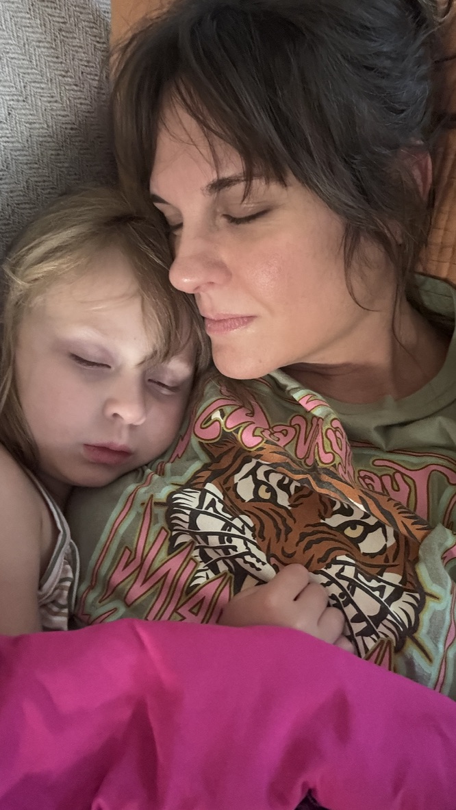 Faith holding Willow as she sleeps